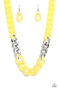 Brushed in a vibrant Empire Yellow finish, a strand of acrylic curb chain combines with links of a silver curb chain to dramatically drape across the chest for a whimsical yet bold look. Features an adjustable clasp closure.  Sold as one individual necklace. Includes one pair of matching earrings.