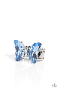 Featuring a faceted crystal finish, a pair of glittery blue gems adorns the scalloped wings of a rhinestone-bodied silver butterfly atop the finger for an eye-catching finish. Features a stretchy band for a flexible fit.  Sold as one individual ring.
