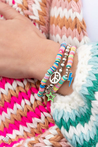 Multicolored clay discs with silver beads, combine with a strand of silver beads with additional silver accents for a dramatic pop of color along the wrist on stretchy bands. Dangling from the multicolored stacks, a painted blue lightning bolt charm and a silver peace sign add a psychedelic finish to the design.  Sold as one set of three bracelets.