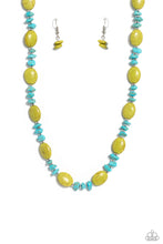 Load image into Gallery viewer, Infused on an invisible wire, dainty silver beads, chiseled turquoise stones, and oval Leek Green crackle stones coalesce around the collar for a colorfully, earthy statement. Features an adjustable clasp closure. As the stone elements in this piece are natural, some color variation is normal.  Sold as one individual necklace. Includes one pair of matching earrings.
