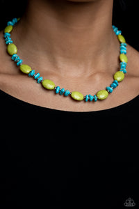 Infused on an invisible wire, dainty silver beads, chiseled turquoise stones, and oval Leek Green crackle stones coalesce around the collar for a colorfully, earthy statement. Features an adjustable clasp closure. As the stone elements in this piece are natural, some color variation is normal.  Sold as one individual necklace. Includes one pair of matching earrings.