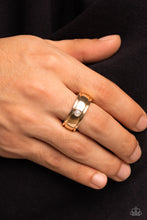 Load image into Gallery viewer, Dotted with a dainty white pearl center, a shiny, sleek gold band stands out against the finger for a sophisticated finish. Features a stretchy band for a flexible fit.  Sold as one individual ring.
