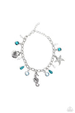 Load image into Gallery viewer, Dainty baroque pearls, clear Harbor Blue and Waterspout faceted beads in silver frames, intricate silver seahorse, starfish, and sea scallop seashell charms, and milky Harbor Blue and Waterspout teardrop beads swing from a silver link chain, creating a beachy fringe around the wrist. Features an adjustable clasp closure.  Sold as one individual bracelet.
