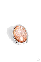 Load image into Gallery viewer, Featuring a refracted shimmer, an oversized oval-cut, glossy orange gem sparkles from an asymmetrical silver frame for an edgy statement piece atop the finger. Features a stretchy band for a flexible fit.  Sold as one individual ring.
