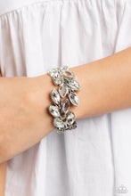 Load image into Gallery viewer, White and clear marquise-cut gems blossom from an array of silver marquise frames embossed in leafy filigree and tactile studs. Each frame interlocks around the wrist in a whimsical pattern to create a laurel-inspired design. Features a hinged closure.  Sold as one individual bracelet.
