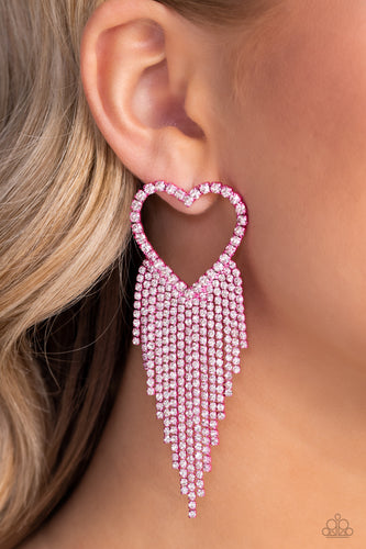 Glassy white rhinestones, encrusted along the front of a pink heart frame, create a flirty centerpiece. Staggered rows of white rhinestones pressed in delicate pink square fittings cascade from the sparkly centerpiece, adding glitzy movement to the romantic piece. Earring attaches to a standard post fitting.  Sold as one pair of post earrings.