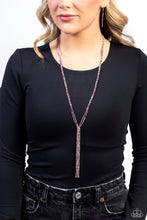 Load image into Gallery viewer, Featuring sleek square fittings, two strands of glittery, dainty multicolored pink rhinestones connect down the chest for a refined centerpiece. The interconnected rows delicately give way to freefalling multicolored pink layers, creating additional strands of glitzy movement. Features an adjustable clasp closure.  Sold as one individual necklace. Includes one pair of matching earrings.
