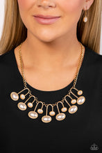 Load image into Gallery viewer, Encased in sleek gold casings, oversized white pearls and shimmery beads lay horizontally across the chest on curved horseshoe-like frames. Delicately stamped in golden studs, the abstract frames swing from the bottom of a classic gold chain for a monochromatic, sophisticated look. Features an adjustable clasp closure.  Sold as one individual necklace. Includes one pair of matching earrings.
