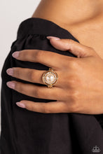 Load image into Gallery viewer, A slightly warped gold hoop encircles a glossy white pearl atop a dainty gold band. A daintier warped gold hoop, encrusted with white rhinestones, curls around the pearl inside the larger gold hoop for a touch of glitz to the sophisticated centerpiece. Features a dainty stretchy band for a flexible fit.  Sold as one individual ring.
