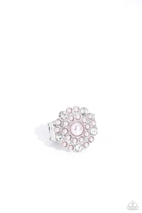An explosion of white gems and dainty glossy baby pink pearls encircle a larger baby pink pearl center, creating a glamorous silver centerpiece atop the finger. Features a stretchy band for a flexible fit.  Sold as one individual ring.
