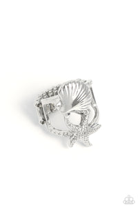 Featuring a layered design, a textured silver seashell crowns the uppermost band of an airy centerpiece, while a studded silver starfish is encrusted along the lowermost band for a beachy look. Features a stretchy band for a flexible fit.  Sold as one individual ring.