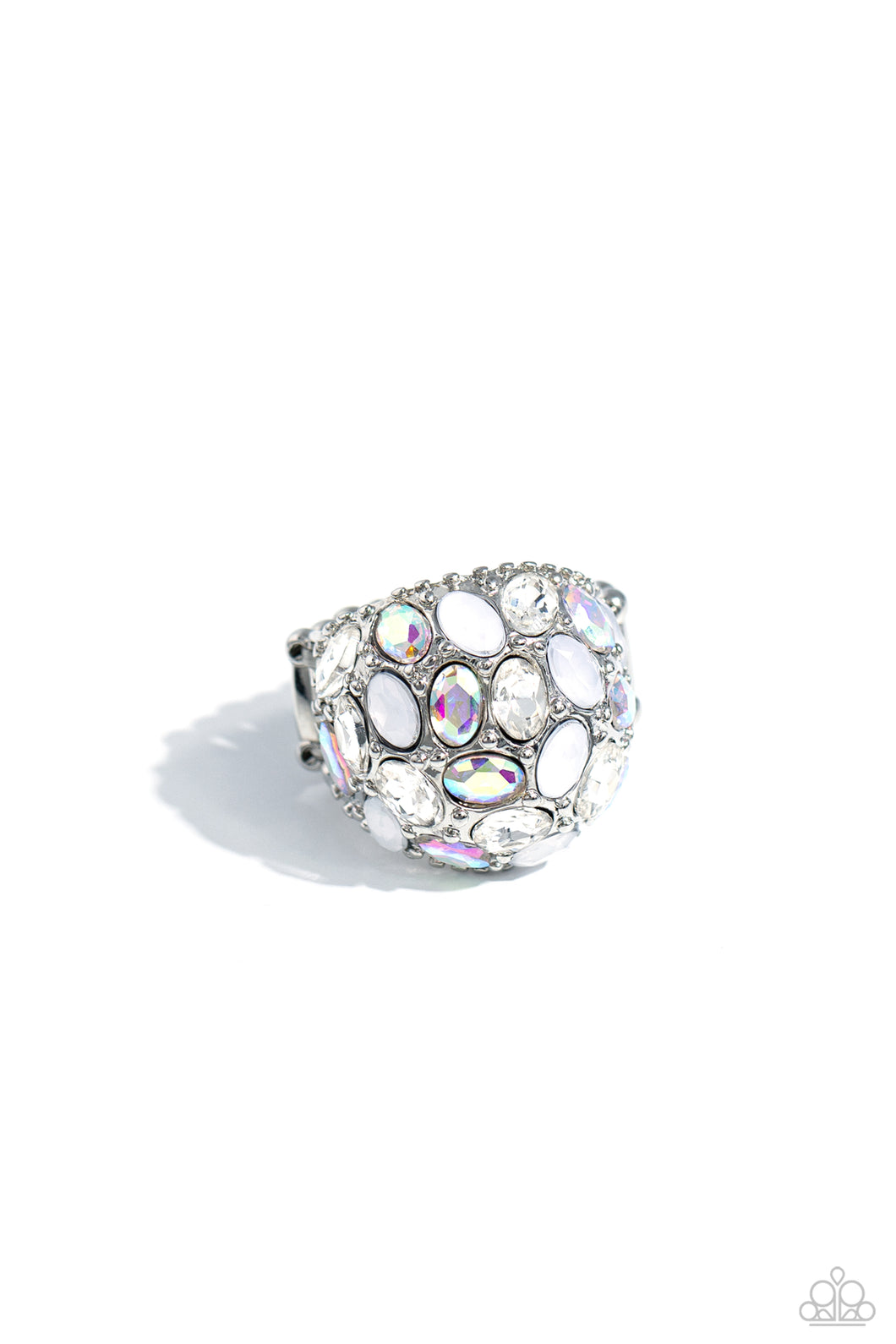 A studded silver frame, filled with blinding oval-cut gems in opalescent, white, and iridescent shades, stands out atop the finger for a blingy statement. Features a stretchy band for a flexible fit. Due to its prismatic palette, color may vary.  Sold as one individual ring.