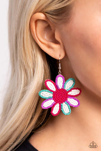 Layers of white seed bead petals, encased in seed bead frames of hot pink, tiffany, and lavender fan out from a hot pink seed bead center, blooming into a textured floral lure. Earring attaches to a standard fishhook fitting. Sold as one pair of earrings.