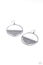 Load image into Gallery viewer, A curtain of white rhinestones is stretched between the edges of a skinny, oversized gunmetal hoop, creating a shimmering display. The rhinestones taper towards the center as they sway and cascade, adding sparkly movement for a fierce industrial finish. Earring attaches to a standard fishhook fitting.  Sold as one pair of earrings.
