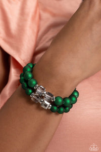 Two strands of oversized emerald green beads featuring a subtle shimmer, silver accents, and clear gray cubed beads stretch around the wrist, creating refined, colorful layers.  The Complete Look! Necklace: "Shopaholic Season - Green"