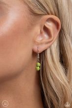 Load image into Gallery viewer, Dipped in an iridescent finish, varying sizes of green pearls cluster around the neckline in a dreamy pop of color. Dainty silver beads alternate along the collar and pearly clusters for a touch of industrial shimmer. Features an adjustable clasp closure. Due to its prismatic palette, color may vary.   Featured inside The Preview at Made for More! Sold as one individual choker necklace. Includes one pair of matching earrings.

