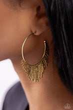 Load image into Gallery viewer, Cascading strands of brass seed beads stream out from the bottom of a classic brass hoop, resulting in a flirtatiously tasseled look. Earring attaches to a standard post fitting. Hoop measures approximately 1 1/2&quot; in diameter.  Sold as one pair of hoop earrings.
