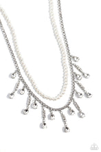 Load image into Gallery viewer, Featuring a white rhinestone square-fitting chain, white teardrop-cut gems, bordered in silver pronged fittings, swing from streams of glittery rhinestones while solitaire teardrop gems drip in an alternating pattern. A strand of gleaming white pearls layers above the silver display for a luxurious finish around the collar. Features an adjustable clasp closure.  Sold as one individual choker necklace. Includes one pair of matching earrings.
