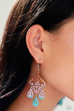 Load image into Gallery viewer, Three rhinestone-encrusted teardrops drip from the bottom of an ornate decorative frame, creating an elegant fringe. The decorative frame swirls with ombré rhinestones that go from orange to pink to blue shades in varying sizes for a timelessly over-the-top sparkle. Earring attaches to a standard fishhook fitting.  Sold as one pair of earrings.
