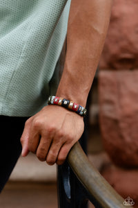 Sections of green, blue, red, brown, and black leather wrap around an urban brown leather band. Emerald-cut silver frames stud the centers of each multicolored suede band, adding a touch of industrial grit to the rustic display. Features an adjustable snap closure.  Sold as one individual bracelet.