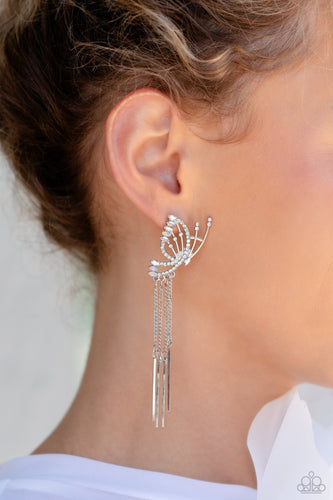 Featuring dainty white rhinestones and dainty marquise-cut iridescent gems, a thin, elongated, airy silver butterfly is titled to the side as if about to take off in flight. A collection of dainty silver rods swings from dainty silver chain tassels at the bottom of the whimsical frame for some free-falling movement. Earring attaches to a standard post fitting. Due to its prismatic palette, color may vary.  Sold as one pair of post earrings.