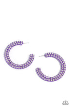 Load image into Gallery viewer, The outer curve of an oversized thick metallic purple hoop is encrusted in a staggered double row of dazzling white rhinestones for a flawless look. Earring attaches to a standard post fitting. Hoop measures approximately 2 1/4&quot; in diameter.  Sold as one pair of hoop earrings.
