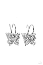 Load image into Gallery viewer, A small, skinny, shiny silver hoop curves around the ear in a timeless fashion. A shiny silver ball is affixed to the end of the hoop, reminiscent of a barbell fitting. A white rhinestone-encrusted butterfly frame, layered in front of a shiny silver airy butterfly frame, slides along the curvature of the hoop, adding a whimsical hint of shimmery movement. Earring attaches to a standard post fitting. Hoop measures approximately 1/2&quot; in diameter.  Sold as one pair of hoop earrings.
