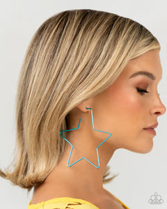 A thin, oversized blue metallic bar delicately folds into a star-shaped hoop, resulting in a stellar statement. Earring attaches to a standard post fitting.  Sold as one pair of hoop earrings.