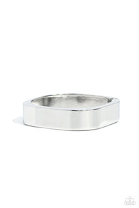 Featuring a sleek, high-sheen finish, a thick silver cuff asymmetrically wraps around the wrist, creating a tilted square centerpiece for a monochromatic staple. Features a hinged closure.  Sold as one individual bracelet.