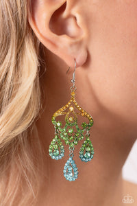 Three rhinestone-encrusted teardrops drip from the bottom of an ornate decorative frame, creating an elegant fringe. The decorative frame swirls with ombré rhinestones that go from yellow to green to blue shades in varying sizes for a timelessly over-the-top sparkle. Earring attaches to a standard fishhook fitting.  Sold as one pair of earrings.