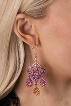 Load image into Gallery viewer, Three rhinestone-encrusted teardrops drip from the bottom of an ornate decorative frame, creating an elegant fringe. The decorative frame swirls with ombré rhinestones that go from pink to purple to orange shades in varying sizes for a timelessly over-the-top sparkle. Earring attaches to a standard fishhook fitting.  Sold as one pair of earrings.
