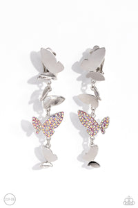 Three butterflies with high-sheen silver wings and one pink iridescent-encrusted butterfly flutter down the ear, creating a free-spirited lure. Each butterfly swings in whimsical asymmetry, creating the look of butterflies flying in alternating directions. Earring attaches to a standard clip-on fitting. Due to its prismatic palette, color may vary.  Sold as one pair of clip-on earrings.