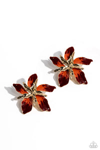 Featuring a warped, metallic texture, a gold flower blooms atop the ear, while a larger gold warped flower featuring Red Dahlia and Burnt Sienna accents adds a vibrant pop of color to the whimsical centerpiece. Earring attaches to a standard post fitting.  Sold as one pair of post earrings.