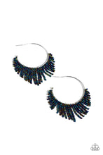 Load image into Gallery viewer, Cascading strands of oil spill seed beads stream out from the bottom of a classic silver hoop, resulting in a flirtatiously tasseled look. Earring attaches to a standard post fitting. Hoop measures approximately 1 1/2&quot; in diameter.  Sold as one pair of hoop earrings.
