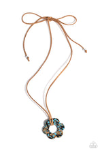 Load image into Gallery viewer, Featuring brown and black marbling, an airy turquoise flower is knotted at the bottom of a lengthened strand of brown suede for a southwestern-inspired statement. Features an adjustable tie closure.  Sold as one individual necklace. Includes one pair of matching earrings.

