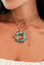 Load image into Gallery viewer, Featuring brown and black marbling, an airy turquoise flower is knotted at the bottom of a lengthened strand of brown suede for a southwestern-inspired statement. Features an adjustable tie closure.  Sold as one individual necklace. Includes one pair of matching earrings.
