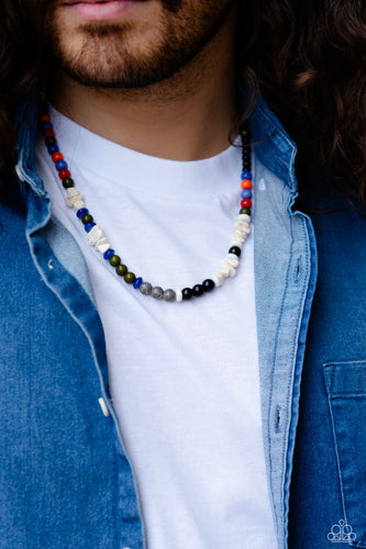 Colorful sections of multicolored beads and gray crackle bead accents adorn a strand of chiseled and round white marbled stones and stone beads, creating an earthy compliment below the collar. Features an adjustable clasp closure. As the stone elements in this piece are natural, some color variation is normal.  Sold as one individual necklace.