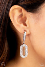Load image into Gallery viewer, Two oversized links, one a sleek silver, the other embellished with a blinding collection of white rhinestones, coalesces into a luxurious lure as it sways from the ear. Earring attaches to a standard clip-on fitting.  Sold as one pair of clip-on earrings.
