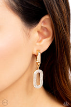 Load image into Gallery viewer, Two oversized links, one a sleek gold, the other embellished with a blinding collection of white rhinestones, coalesces into a luxurious lure as it sways from the ear. Earring attaches to a standard clip-on fitting.  Sold as one pair of clip-on earrings.
