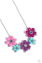 Load image into Gallery viewer, Dotted with dainty Harbor Blue, aquamarine, and rose rhinestone centers, dainty silver flowers bloom against a backdrop of glossy acrylic flowers in Aurora Pink, Rose Violet, Cattleya Orchid, and Spun Sugar hues. Each flower, varying in size, blossoms across a textured collection of silver leaves below the collar, invoking a festive spirit. Features an adjustable clasp closure.  Sold as one individual necklace. Includes one pair of matching earrings.

