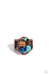 An earthy collection of tiger's eye, turquoise, marbled brown, and various blue stones are pressed into the center of an airy copper oval, for an earthy centerpiece. The oval display rests atop airy copper bands, further highlighting the earthy textures and sheens of the various stones. Features a stretchy band for a flexible fit. As the stone elements in this piece are natural, some color variation is normal.  Sold as one individual ring.