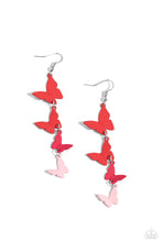 Load image into Gallery viewer, A collection of red, pink, and baby pink butterflies fall from the ear in an alternating, haphazard pattern, slowly decreasing in size, culminating in a whimsical lure. Earring attaches to a standard fishhook fitting.  Sold as one pair of earrings.
