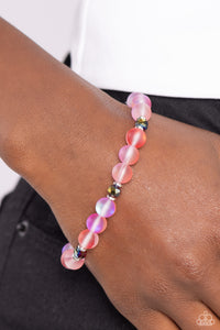 Infused with silver accents and faceted red beads, a dreamy collection of frosted glassy red beads is threaded along a stretchy band around the wrist for an enchanting glow.  Sold as one individual bracelet.