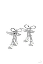 Load image into Gallery viewer, Adorned in sparkling white rhinestones, high-sheen bands of silver curl and loop into a stunning bow charm, creating a classy statement at the ear. White rhinestones encased in scalloped silver fittings, featuring white pearls that slowly increase in size dangle from the bow charm adding a refined tassel to the stunning display. Earring attaches to a standard post fitting.  Sold as one pair of post earrings.
