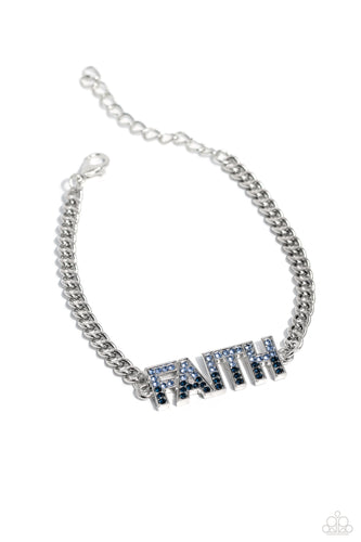 Encrusted in glassy light blue and Montana rhinestones, silver letter frames spell out the word 