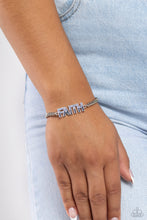 Load image into Gallery viewer,  Encrusted in glassy light blue and Montana rhinestones, silver letter frames spell out the word &quot;FAITH&quot; along a classic silver chain for an inspirational finish around the wrist. Features an adjustable clasp closure.  Sold as one individual bracelet. 
