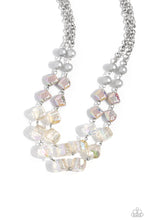 Load image into Gallery viewer, Featuring a subtle scratch surface, a bubbly collection of silver pearls, abstract iridescent beads, and sparkly crystal-like iridescent beads are threaded along metallic rods that trickle in a two-layer display, creating an elegantly effervescent display below the collar. Features an adjustable clasp closure. Due to its prismatic palette, color may vary.  Sold as one individual necklace. Includes one pair of matching earrings.

