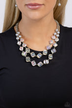 Load image into Gallery viewer, Featuring a subtle scratch surface, a bubbly collection of silver pearls, abstract iridescent beads, and sparkly crystal-like iridescent beads are threaded along metallic rods that trickle in a two-layer display, creating an elegantly effervescent display below the collar. Features an adjustable clasp closure. Due to its prismatic palette, color may vary.  Sold as one individual necklace. Includes one pair of matching earrings.

