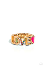 Load image into Gallery viewer, Glistening silver letters arc across the finger, forming the word &quot;LOVE&quot; for a causally romantic finish. The letter &quot;O&quot; features a Classic Green-painted peace sign, the letter &quot;V&quot; features various shades of multicolored rhinestones, while a Pink Peacock-painted heart caps the word, infusing the design with color. Features a dainty stretchy band for a flexible fit.  Sold as one individual ring.
