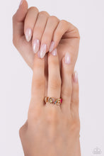 Load image into Gallery viewer, Glistening silver letters arc across the finger, forming the word &quot;LOVE&quot; for a causally romantic finish. The letter &quot;O&quot; features a Classic Green-painted peace sign, the letter &quot;V&quot; features various shades of multicolored rhinestones, while a Pink Peacock-painted heart caps the word, infusing the design with color. Features a dainty stretchy band for a flexible fit.  Sold as one individual ring.
